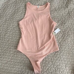BP Women's Pastel Blush Pink Ribbed Bodysuit